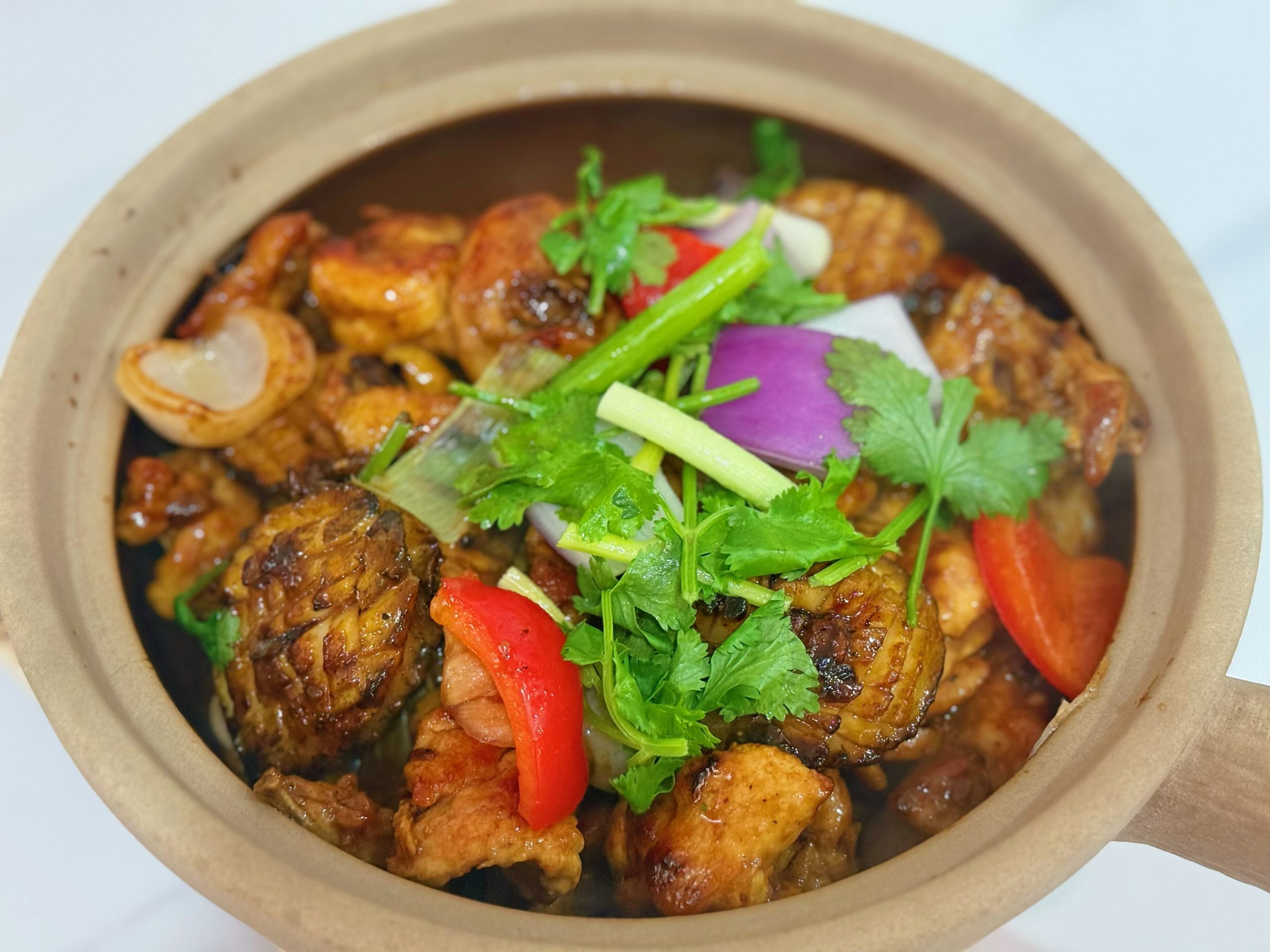 Abalone zhe zhe chicken pot with vegetables at Zhe Zhe Pot, a Chinese Restaurant in Brooklyn