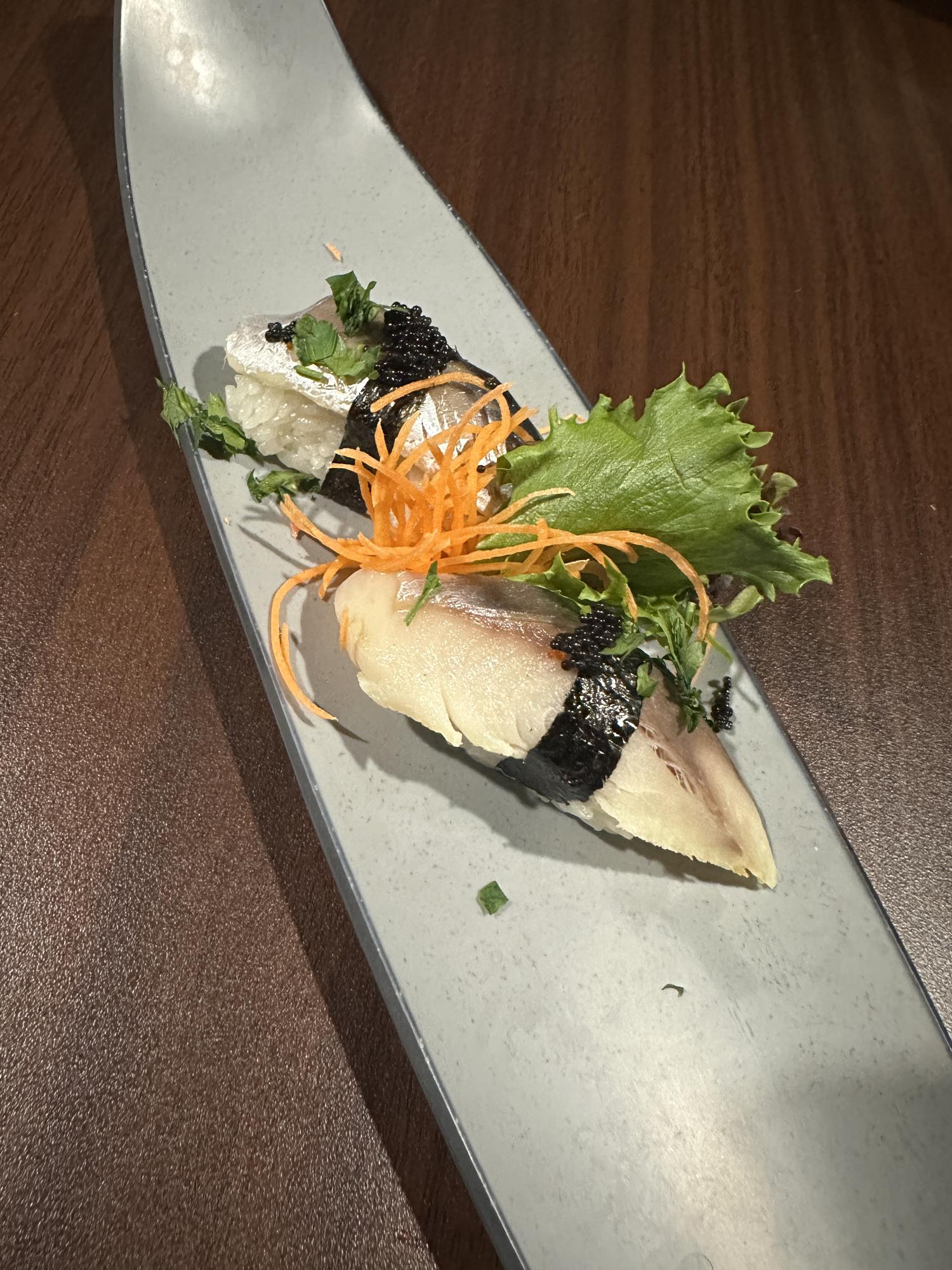 Whitefish Nigiri with Seaweed, Tobiko, Carrot Shreds, and Herbs at ZX Sushi, Japanese Restaurant in Milwaukee